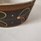 Vintage dish with black and ochre decoration and a speckled crackled interior – 1970s