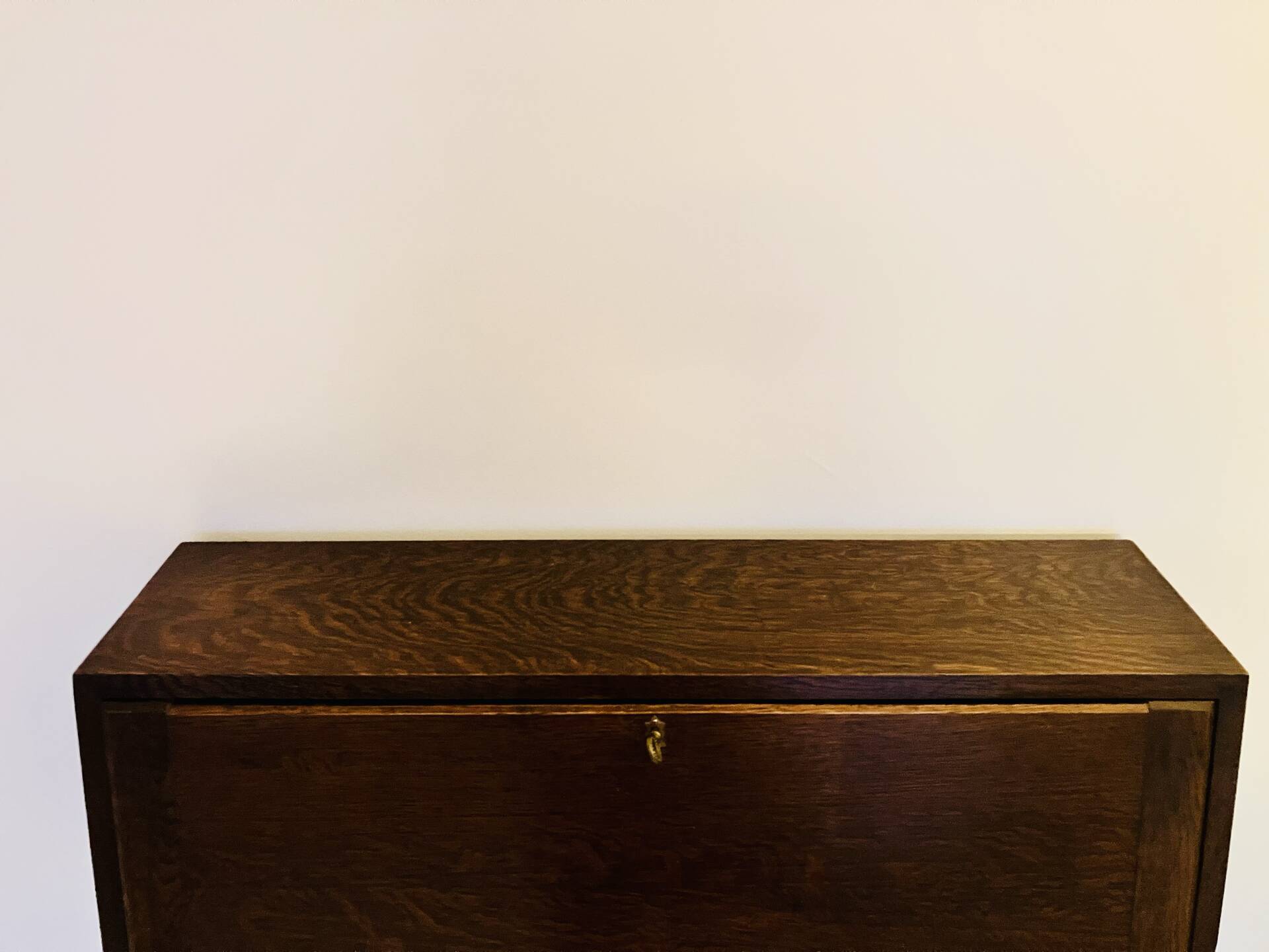 Solid oak secretary with golden feet