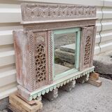 Fully hand-carved stone window with mirror