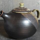 Vintage enameled stoneware potter's teapot