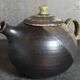 Théière de potier en grès émaillé vintage