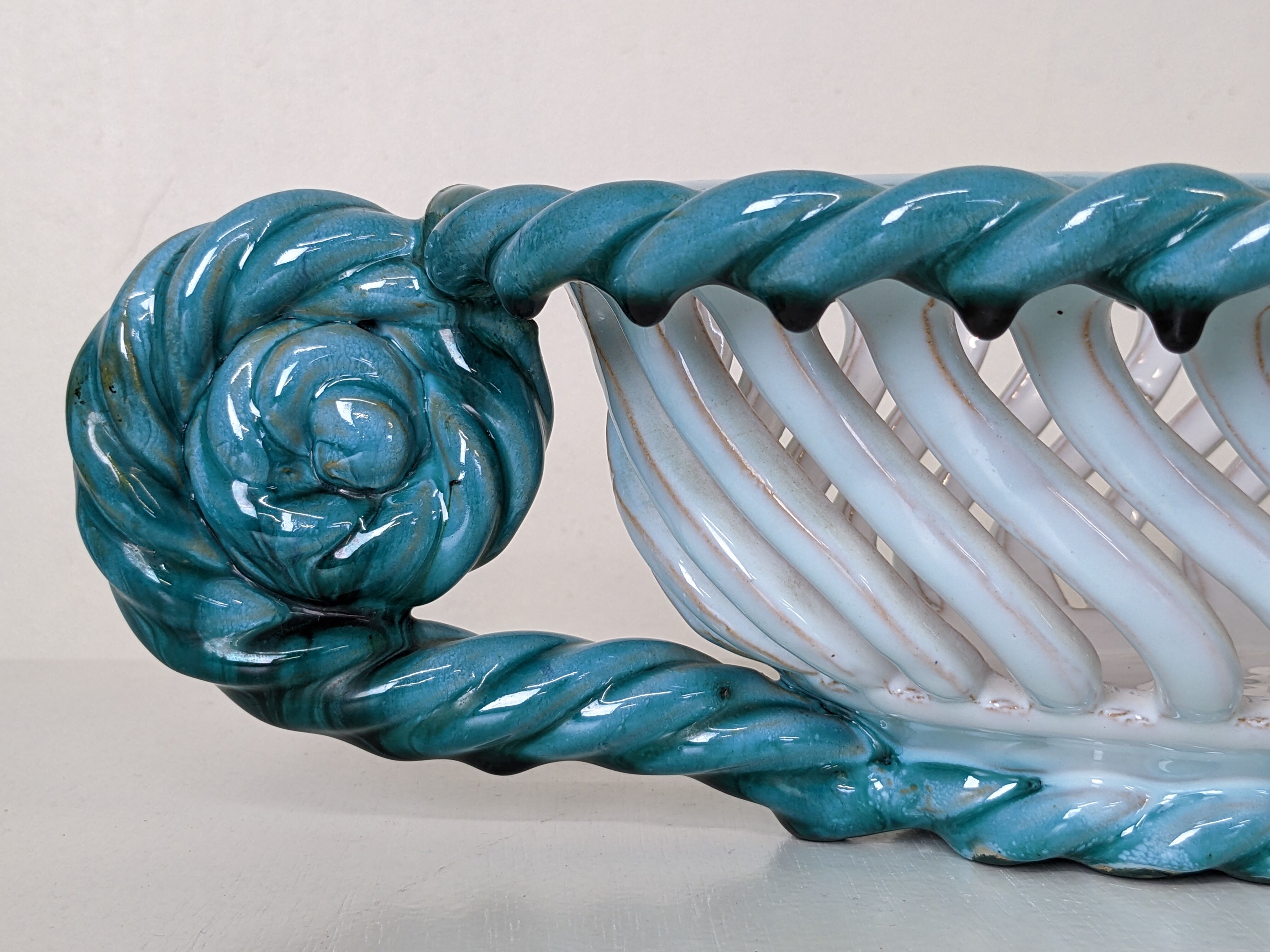 Set of 2 twisted earthenware fruit baskets by Sainte Radegonde, 50s
