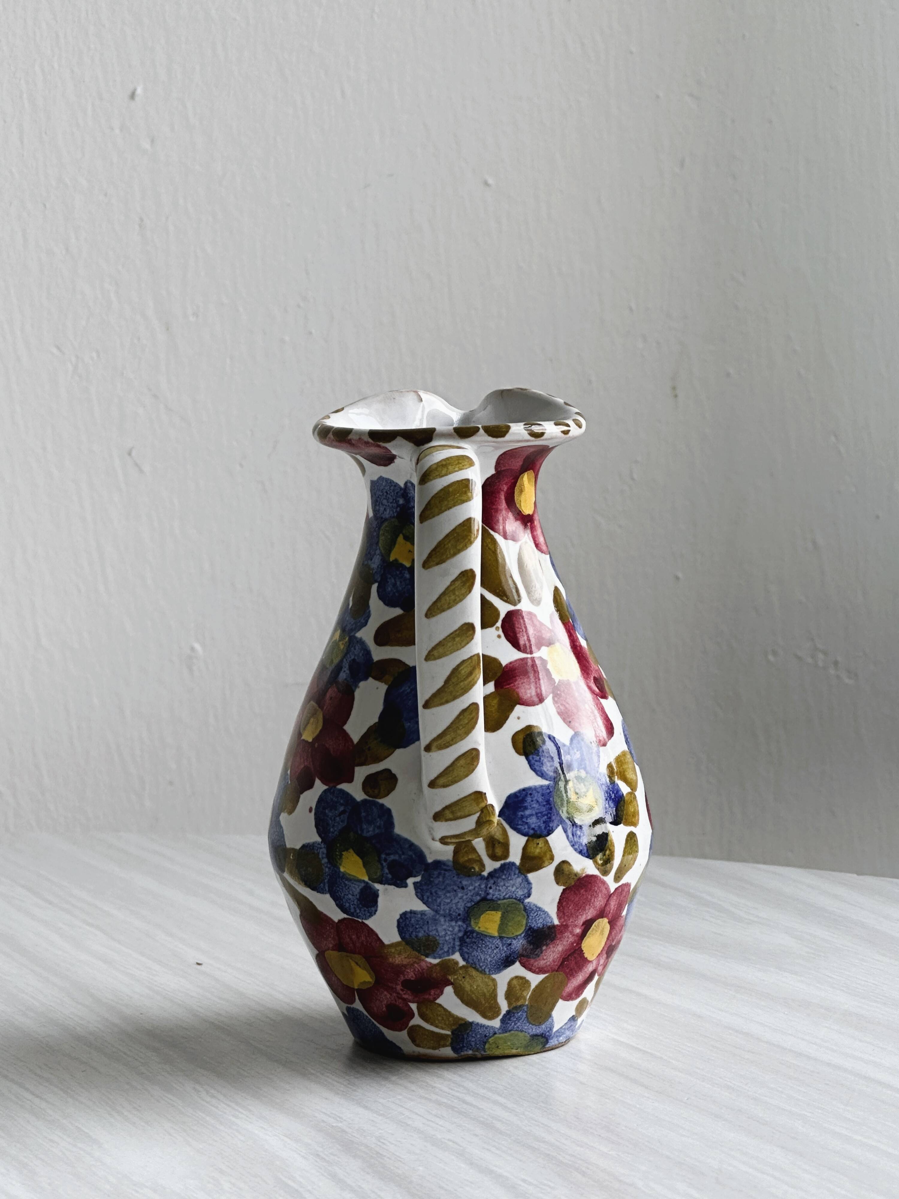 Hand painted ceramic milk jug, oiler