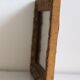 Antique mirror in gilded wood