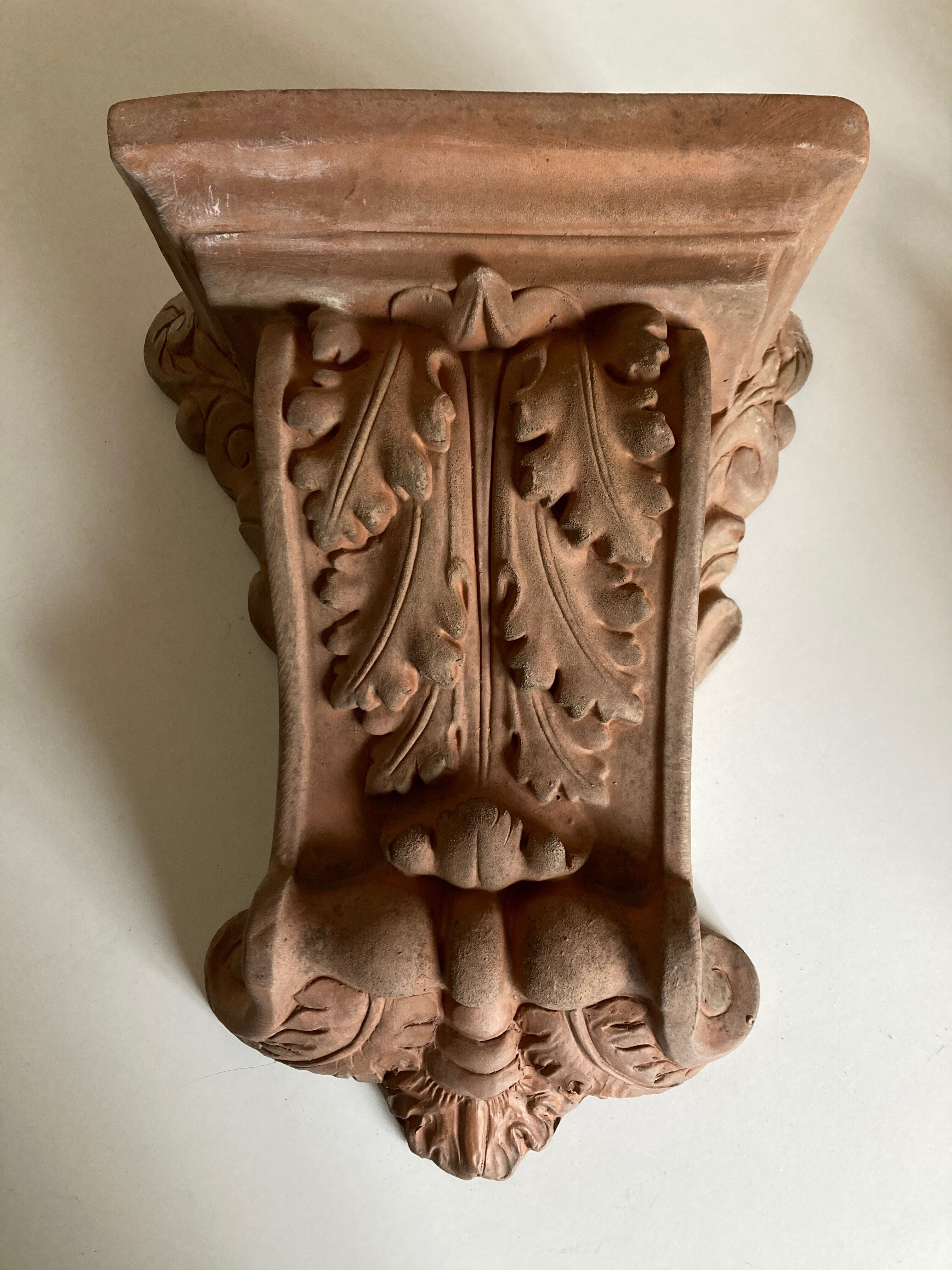 Neo classical console terracotta shelf acanthus leaves