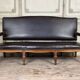 Napoleon III style bench in carved walnut, synthetic leather circa 1880