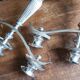 Pair of silver metal candlesticks / 3-branch silver metal candelabras.