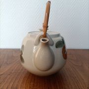 Asian style teapot with bamboo handle