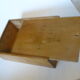 Wooden storage box marked "with a golden hammer"