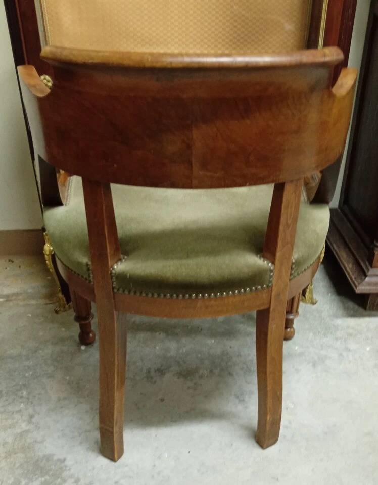 Empire-Charles X walnut office chair with a gondola backrest.
