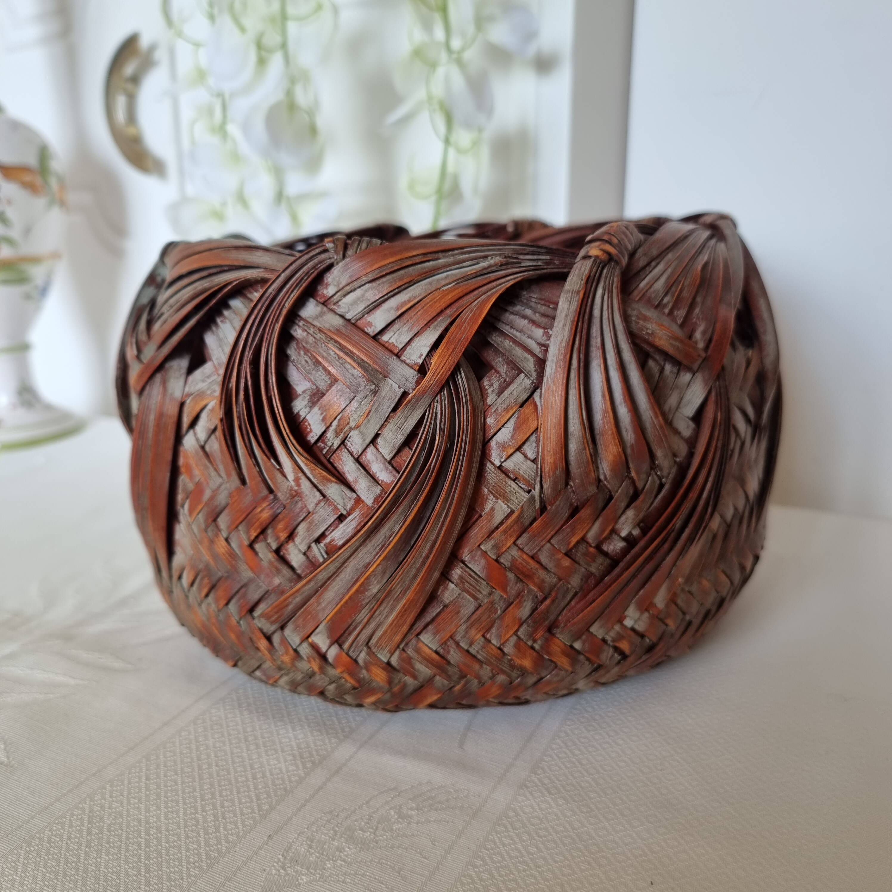 Vintage Japanese Ikebana basket made of smoked bamboo in natural