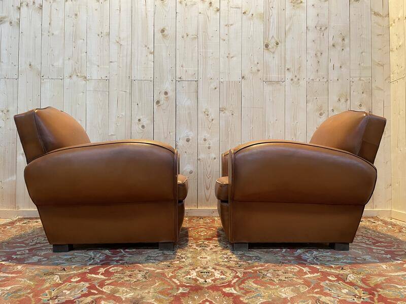 Pair of art deco leather club armchairs
