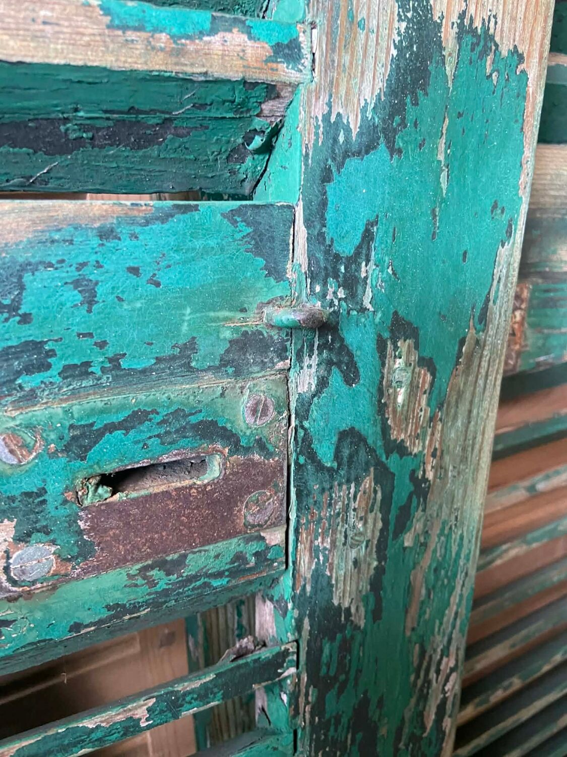 Old green shutter blinds
