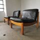 Pair of designer leather armchairs 80s