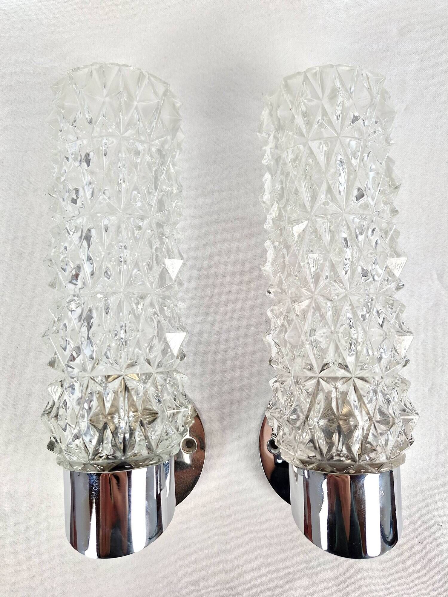 Pair of vintage Art Deco space age chrome and molded glass wall sconces