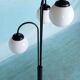 Minimalist floor lamp in glass, space age style.