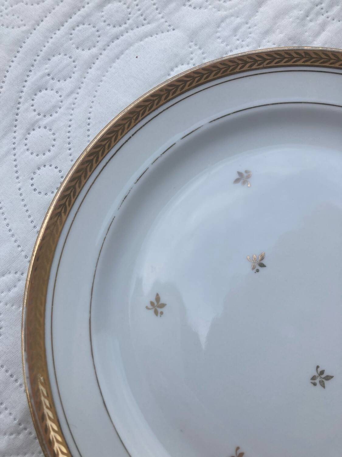 Set of golden Limoges plates