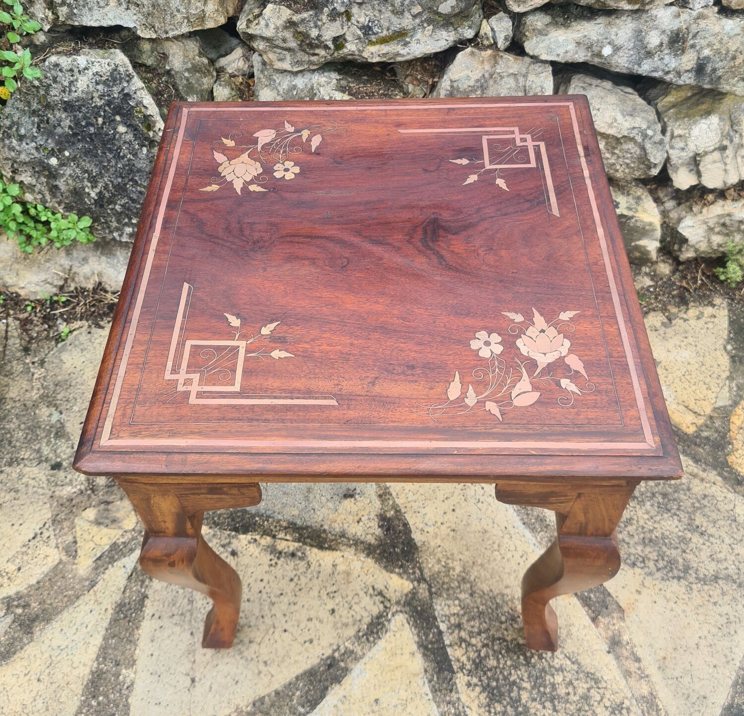 Coffee table in brass marquetry