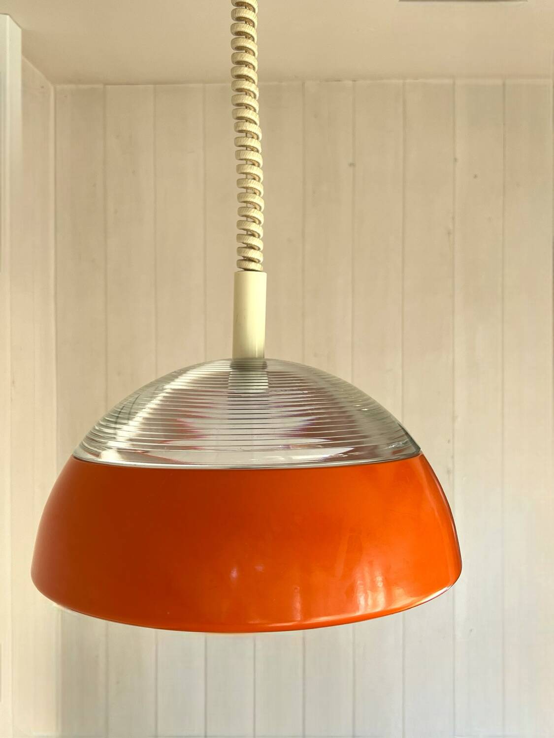 Space-age pendant light in holophane glass and lacquered metal from the 70s.