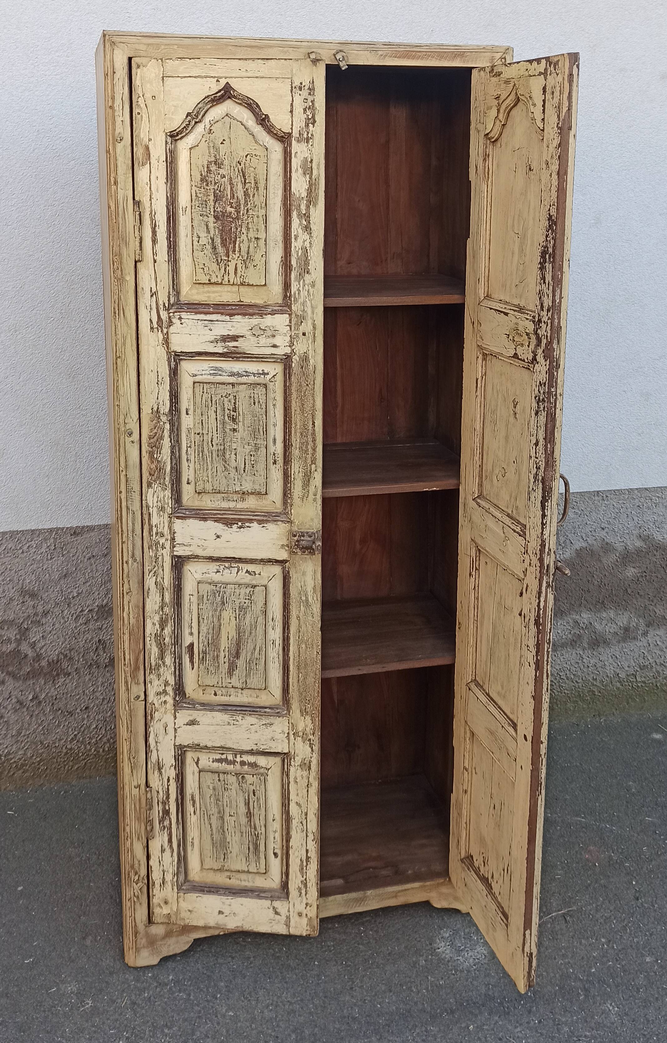 Old yellow wooden cabinet