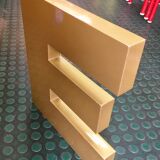 Golden sign letter E