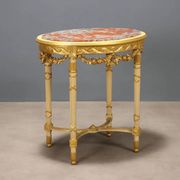 Antique neoclassical centre table in carved wood from the 19th century.