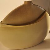 Ceramic with flattened body