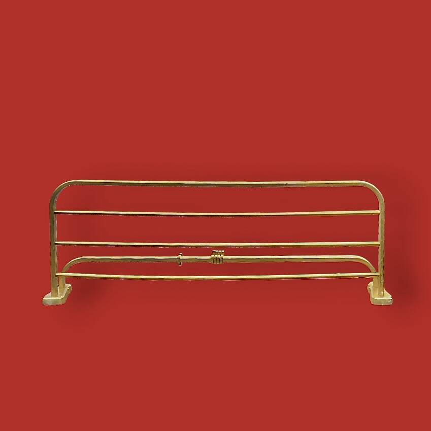 Vintage wall-mounted coat rack in anodised gold aluminium with hat holder.