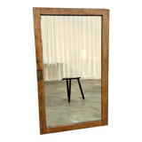 Antique mirror on an elm wardrobe door