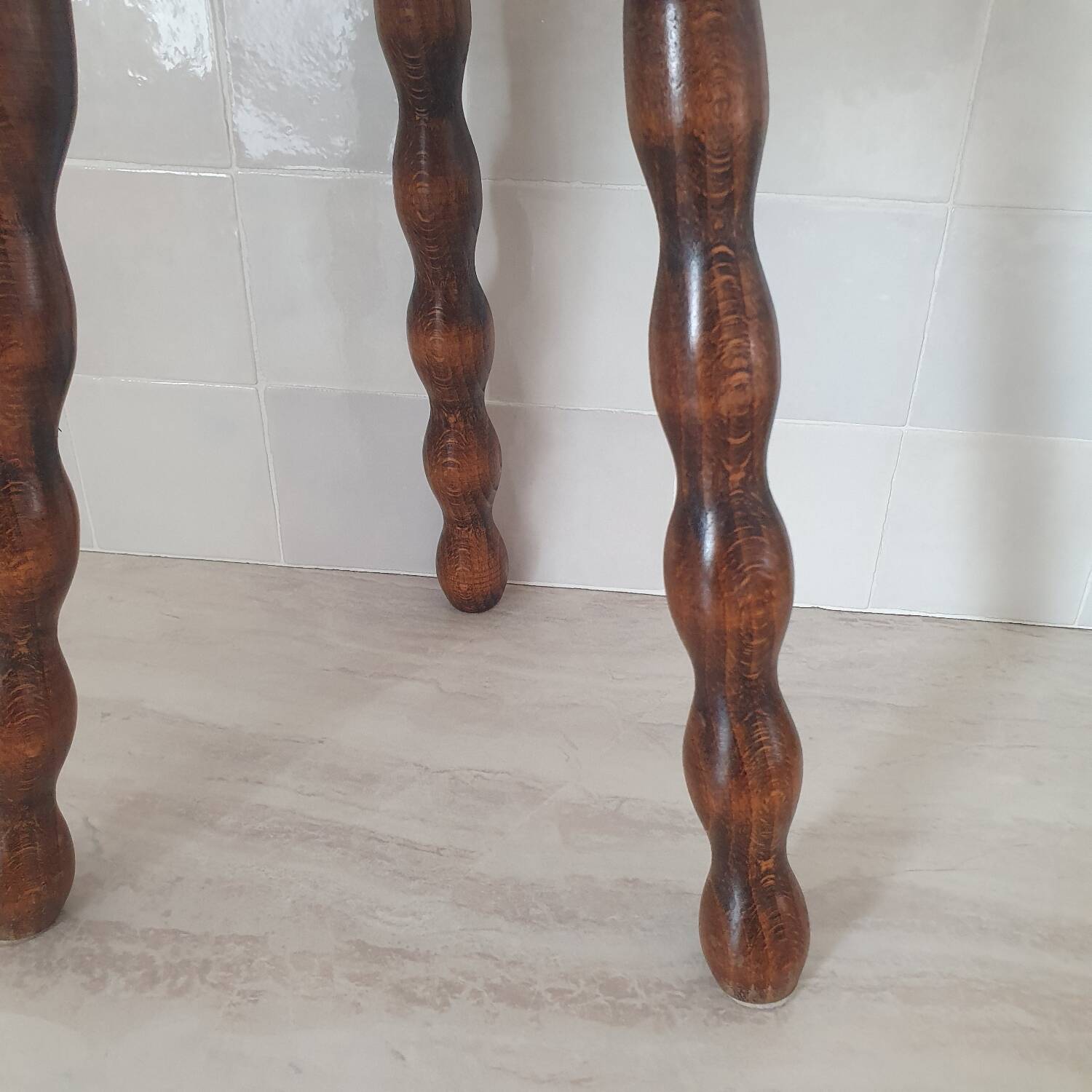 Turned wooden stool / tripod with round seat