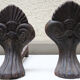 Anciens chenets en fonte coquillage