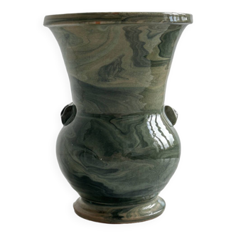 Signed ceramic vase.