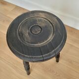 Black wooden tripod stool