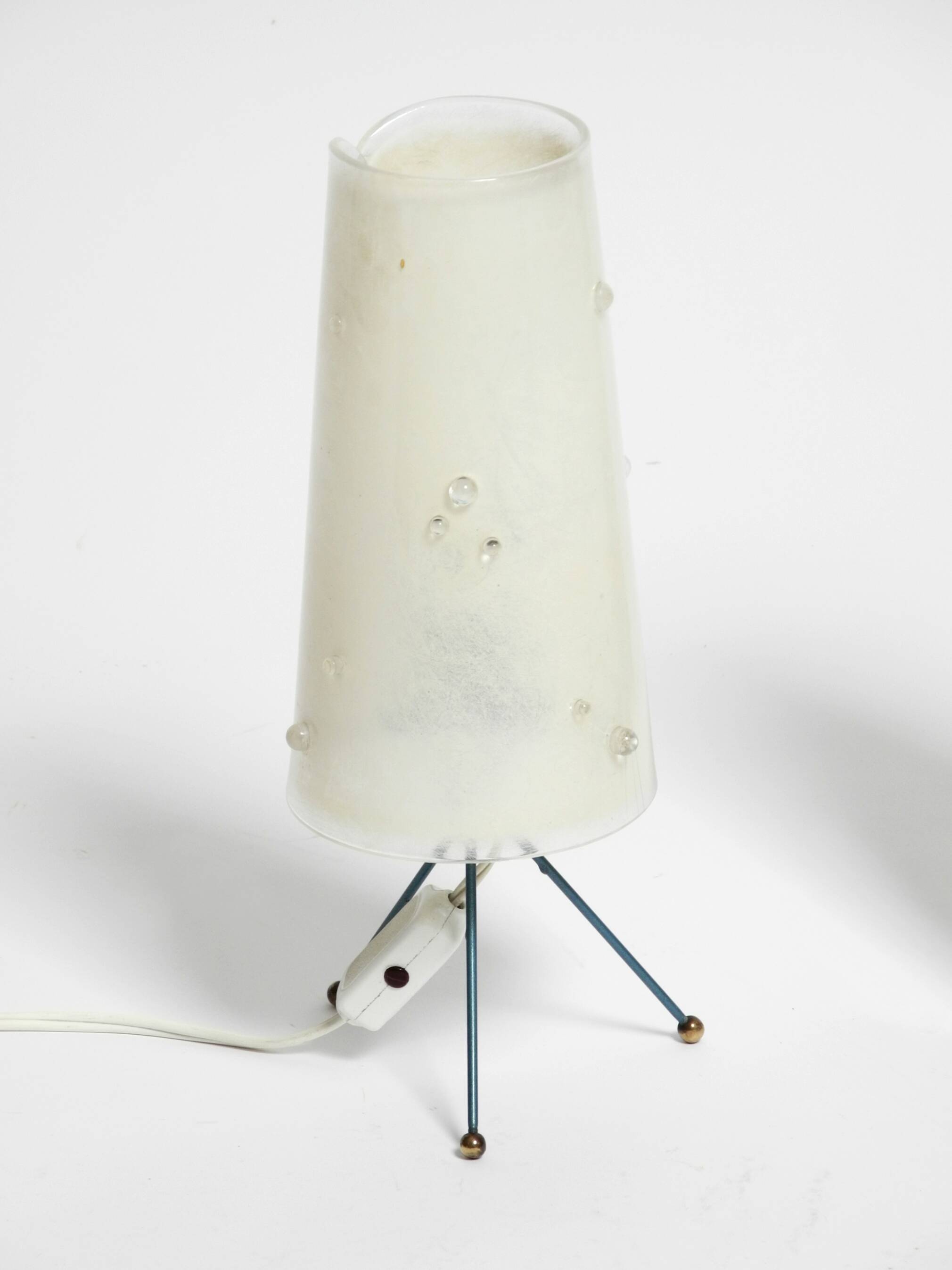 Two very Mid Century Modern tripod table lamps with white plexiglas shades