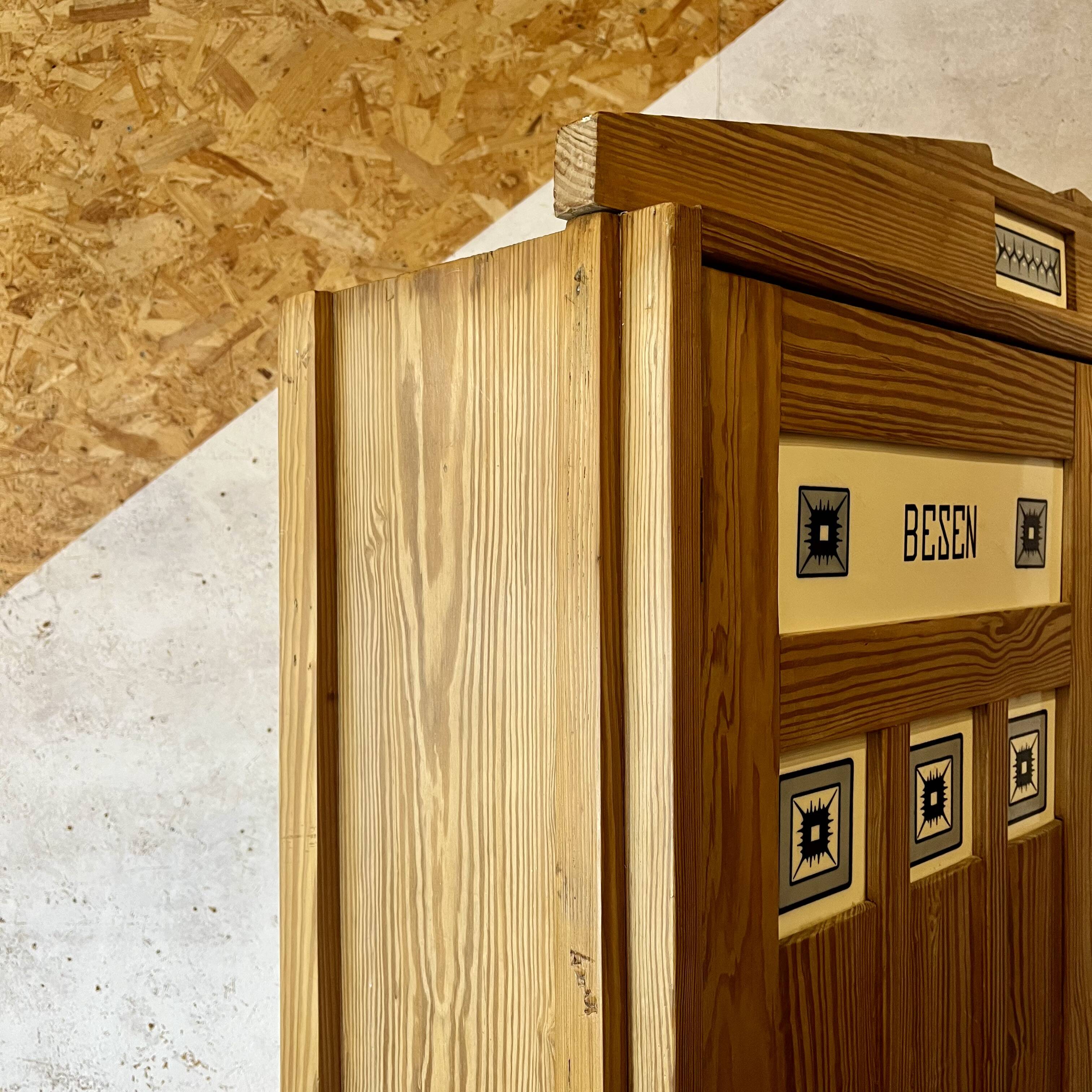 Art Nouveau wardrobe in pine with ceramic tiles, early 20th century.