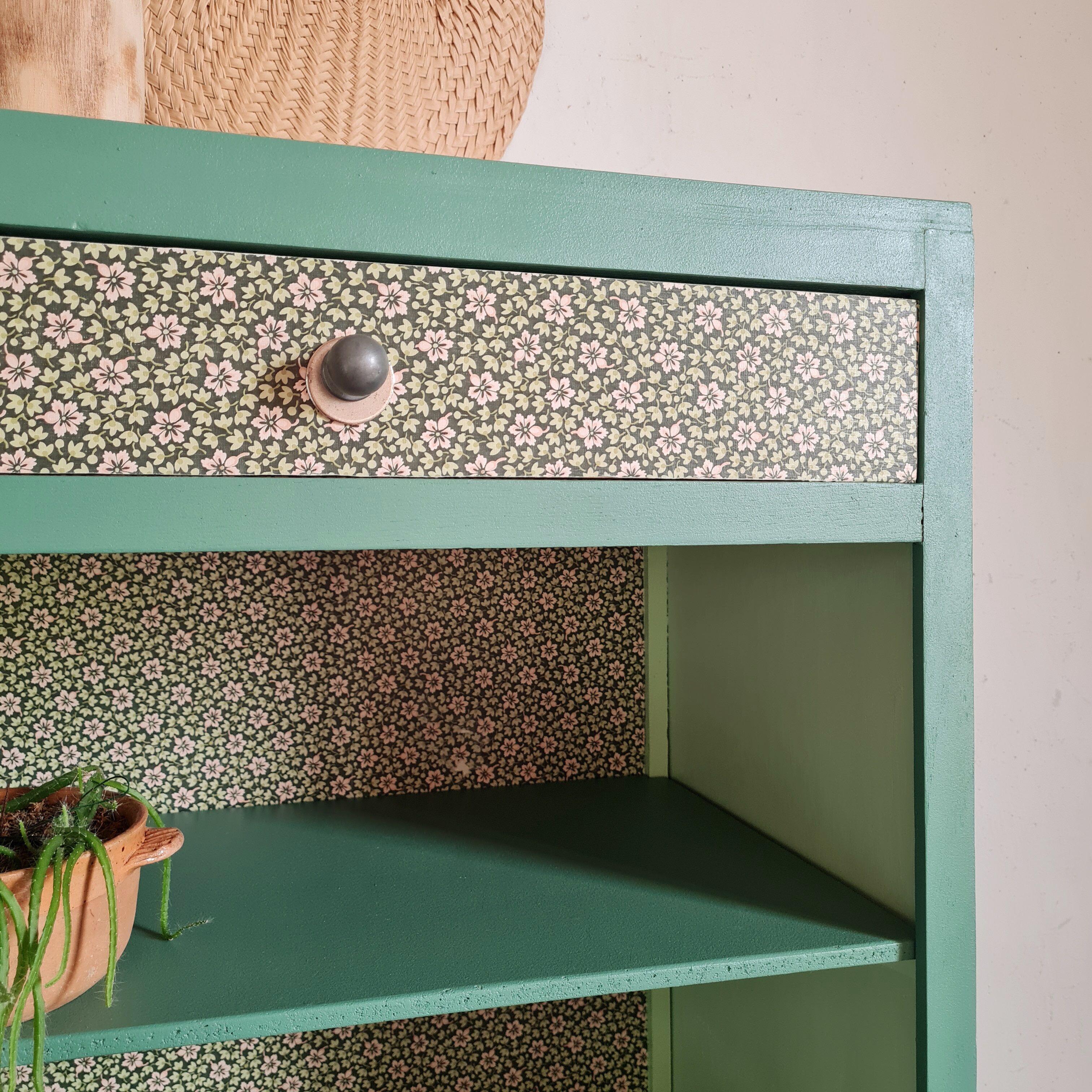 Renovated library shelf green color and floral atmosphere