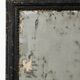 Antique French mirror from the late 19th century with a black painted frame.