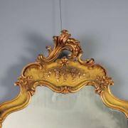Antique baroque-style mirror in gilded carved wood, Italy 19th century.