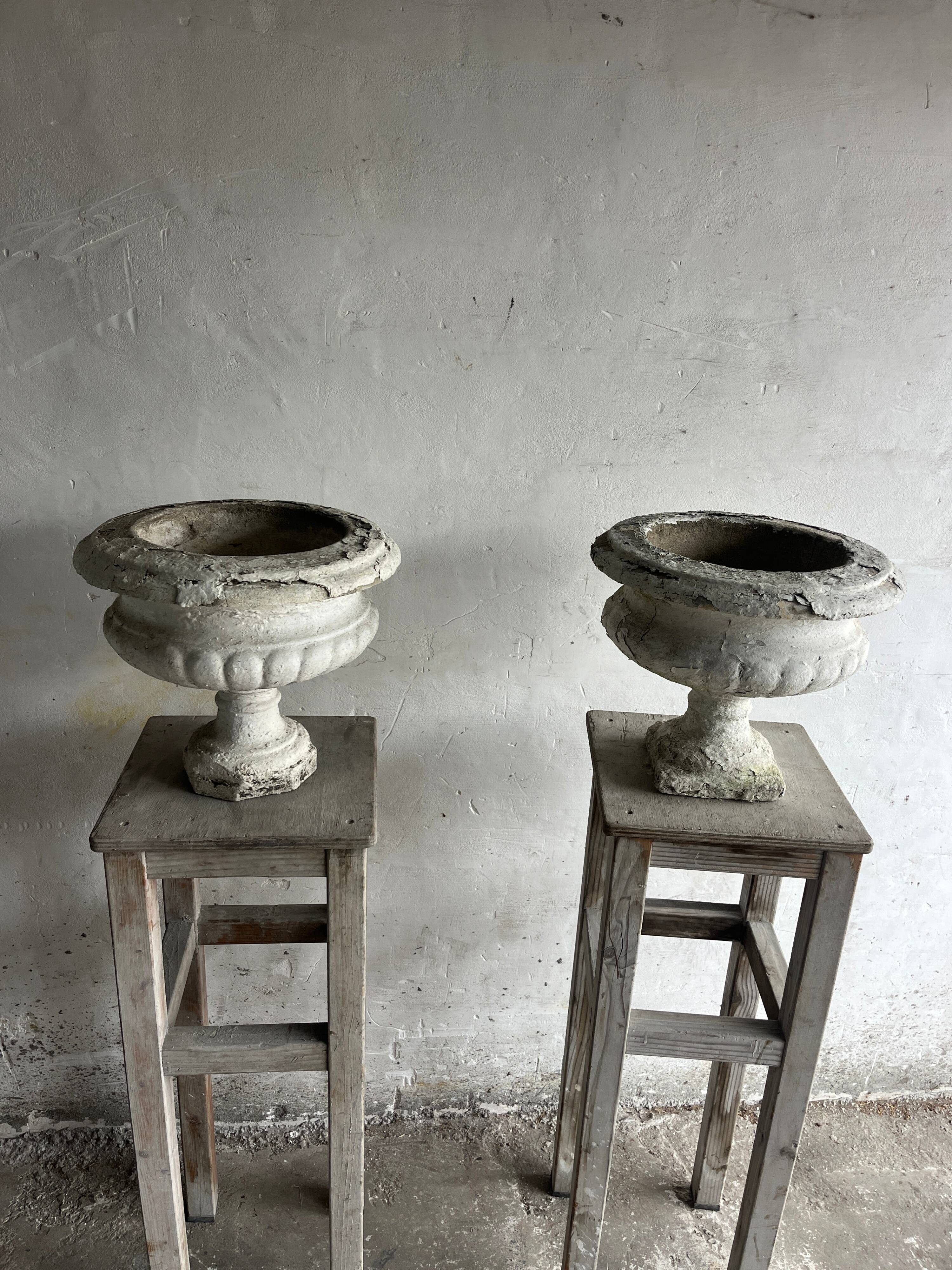 Pair of antique Médicis garden vases in cast stone.