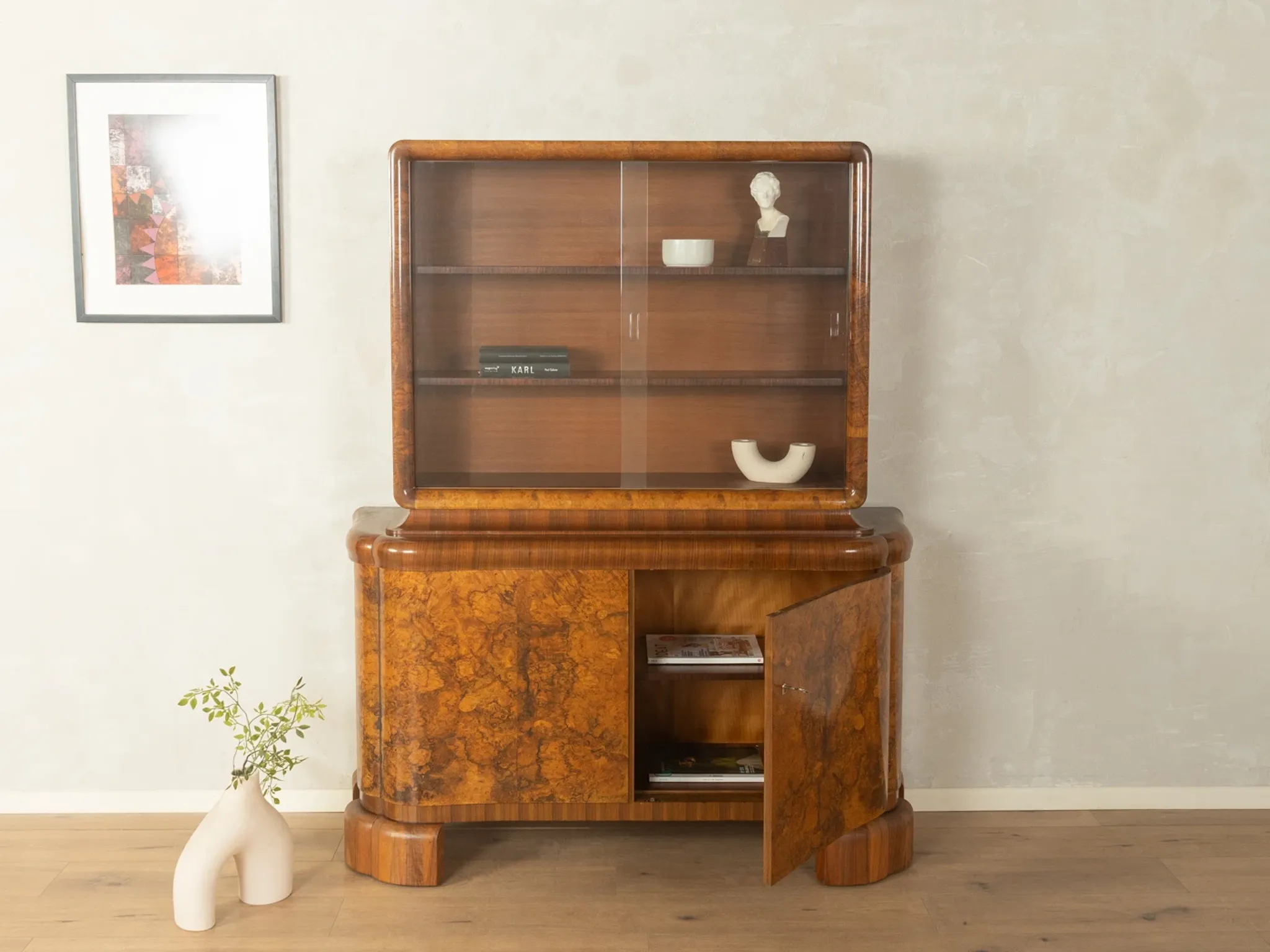 Classic two-piece Art Deco display cabinet from the 1930s with striking burl wood veneer