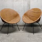 Pair of braided rattan armchairs