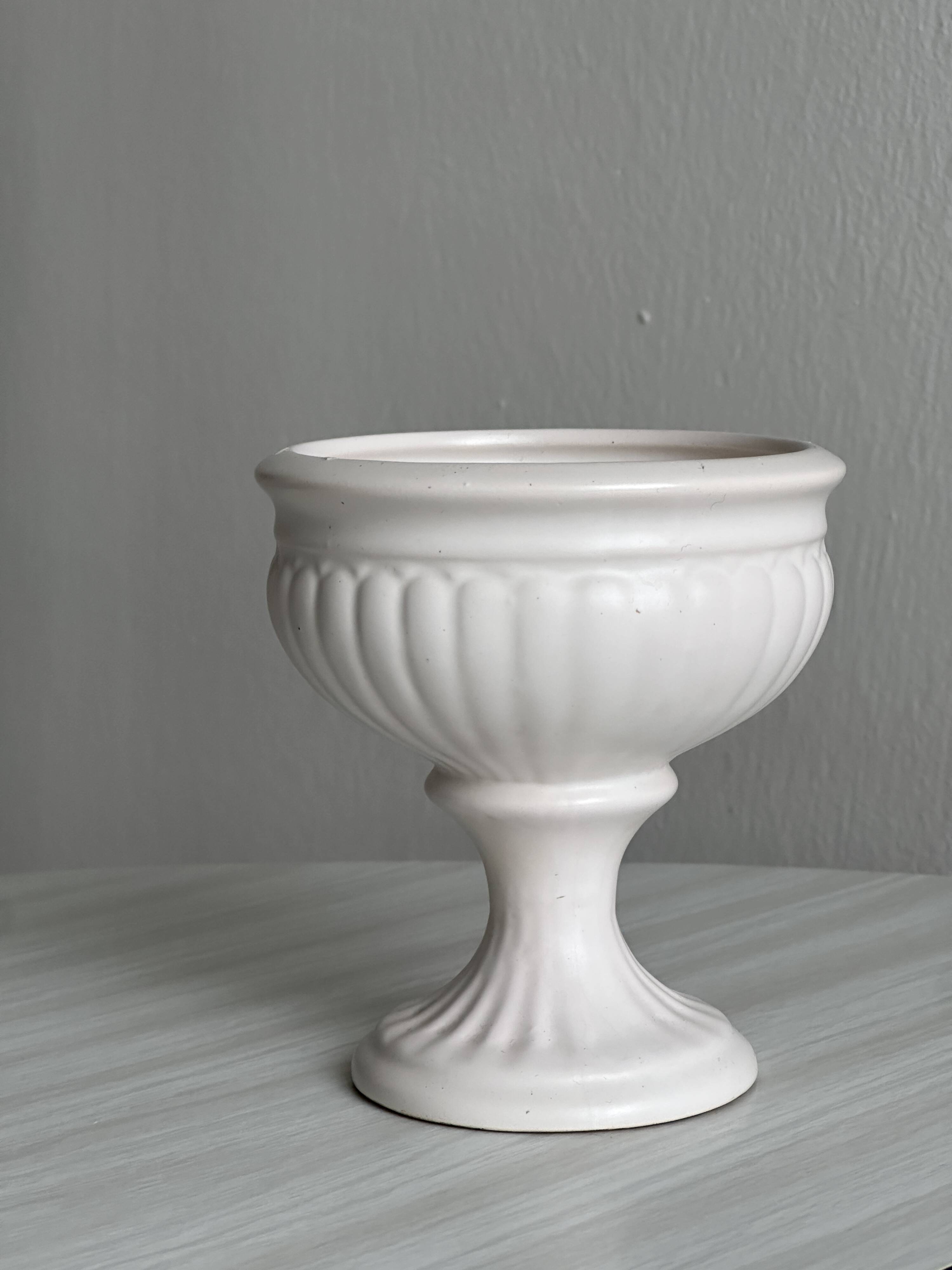 Off-white ceramic footed bowl