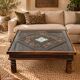 Large square vintage coffee table in wood, glass, and metal decor.