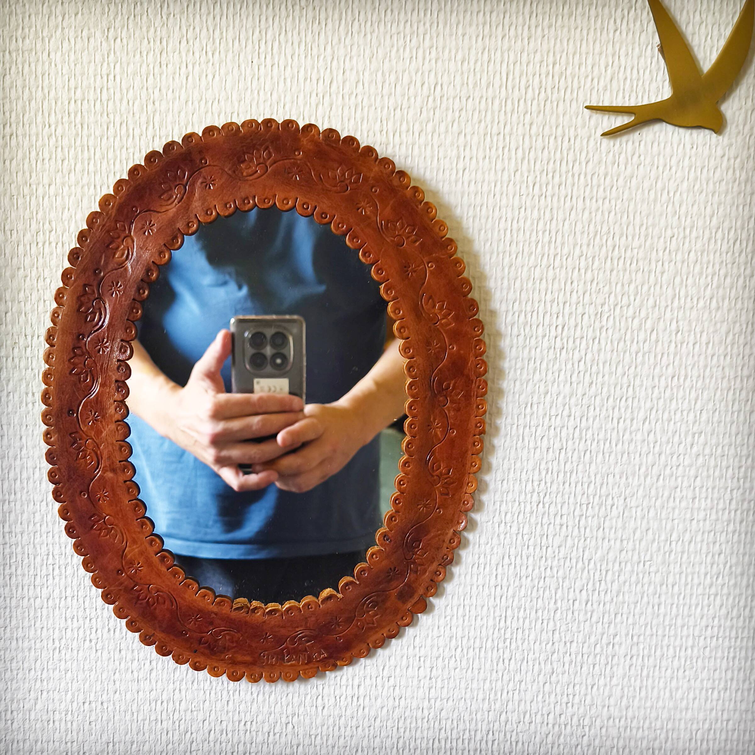 Leather repoussé mirror, Sri Lanka, 1960s