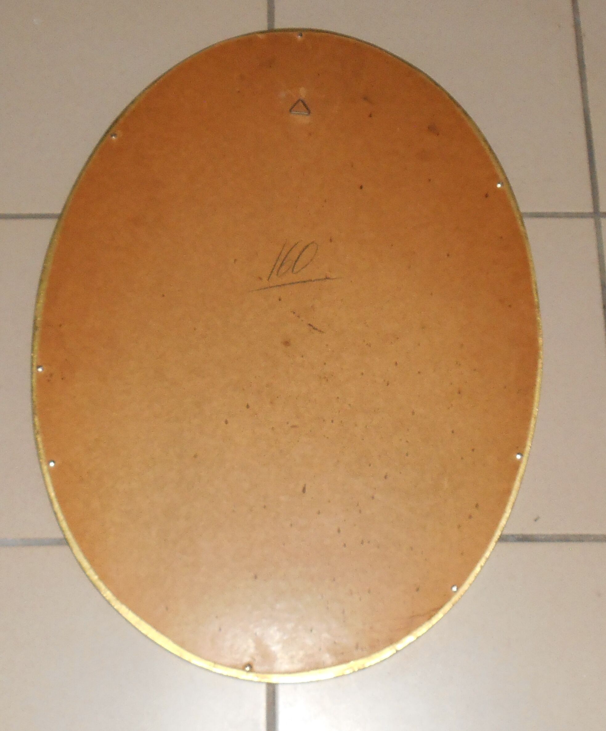 Oval gold mirror