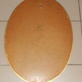 Oval gold mirror