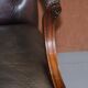 Gainsborough armchair George II leather Chesterfield hand-carved with claw and ball feet.