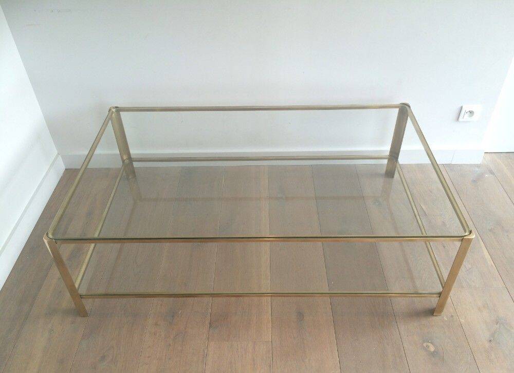 Large coffee table with a double top in polished bronze and glass, signed Jacques Théophile Lepelletier and stamped Broncz.