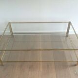 Grande table basse à double plateau en bronze poli et verre signé Jacques Théophile Lepelletier et estampillé Broncz