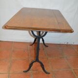 Bistro table with a cast iron base